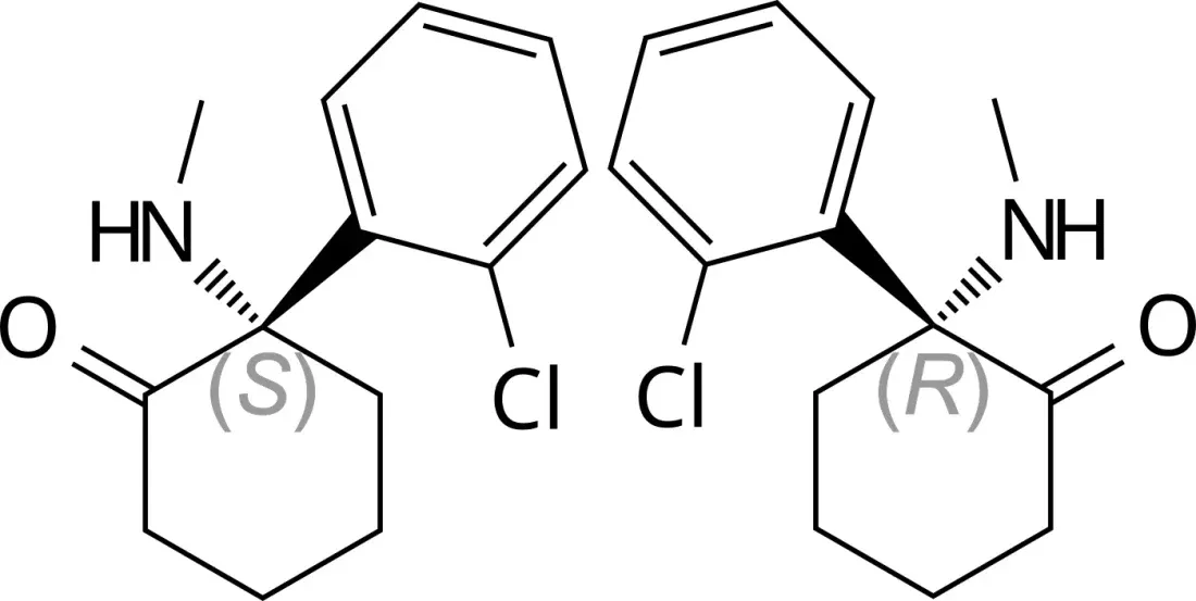 Two labelled skeletal chemical structures side by side, mirror images of each other, each showing a chlorinated benzene ring attached to a six-membered ring bearing a ketone and a methylamine group.